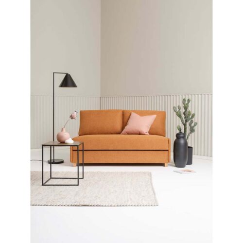 Smiley bäddsoffa i orange tyg.