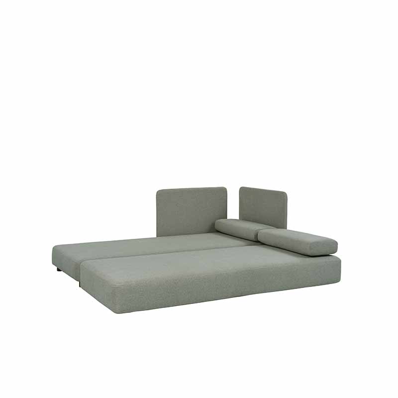 Nordic dagbädd i utbäddat läge i grönt tyg.