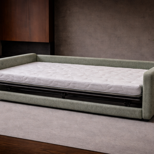 Reverse bäddsoffa i utbäddat läge.